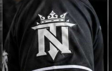 Embroidered crowned TN logo on a black custom jersey