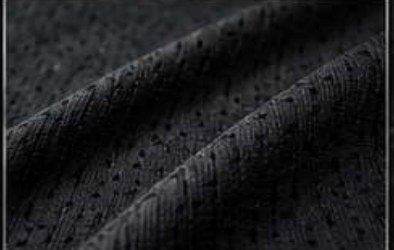 Lightweight breathable moisture-wicking polyester jersey fabric close-up