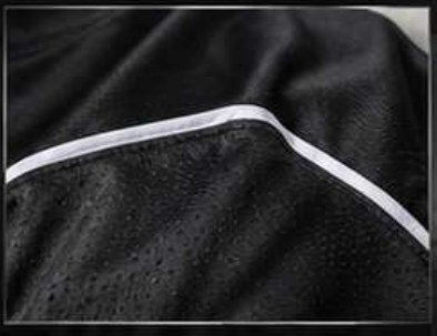 Reinforced flatlock stitching detail on a custom jersey